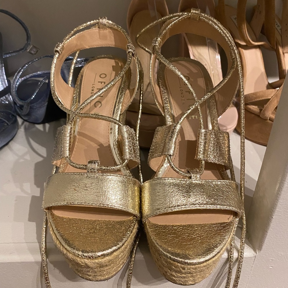 Gold Platform wedges in size 6.
